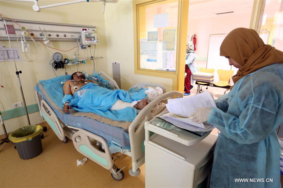 LIBYA-MISRATA-WOUNDED SOLDIER-MEDICAL TREATMENT