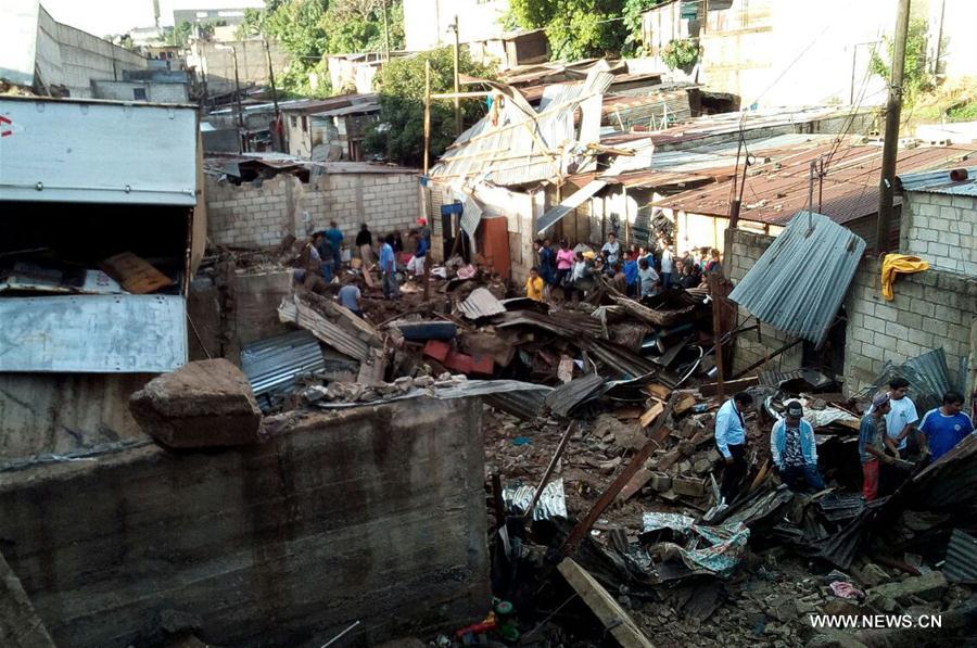 According to local press, at least nine people were killed in the landslide caused by heavy rain on Tuesday night in Villa Nueva.