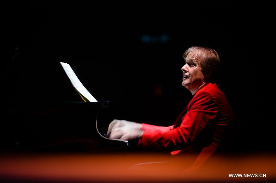 French pianist Richard Clayderman performs during a concert in Nanjing, capital of east China's Jiangsu Province, Sept. 16, 2016.