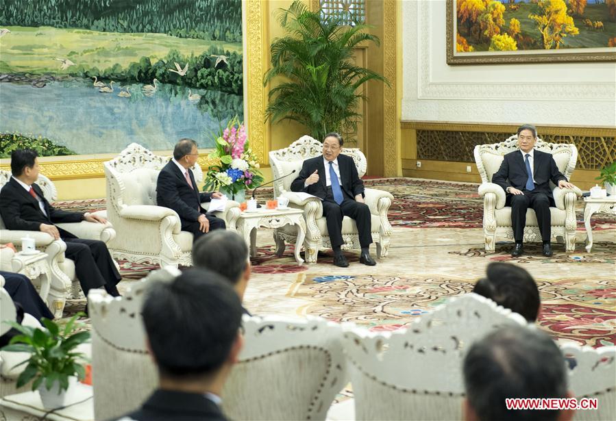 Yu Zhengsheng (2nd R, rear), chairman of the Chinese People's Political Consultative Conference (CPPCC) National Committee, meets with a delegation of county and city officials from Taiwan, in Beijing, capital of China, Sept. 18, 2016. (Xinhua/Wang Ye) Yu Zhengsheng (2nd R, rear), chairman of the Chinese People's Political Consultative Conference (CPPCC) National Committee, meets with a delegation of county and city officials from Taiwan, in Beijing, capital of China, Sept. 18, 2016. (Xinhua/Wang Ye)