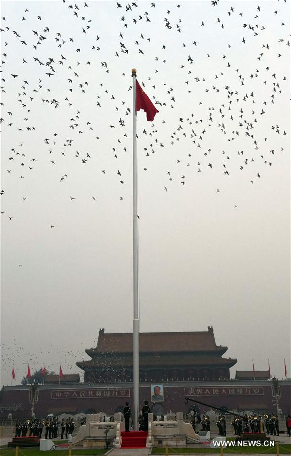 Over 100,000 people from across the country gathered at the Tian'anmen Square to watch the national flag-raising ceremony on the morning of Oct. 1, marking the 67th anniversary of the founding of the People's Republic of China. Over 100,000 people from across the country gathered at the Tian'anmen Square to watch the national flag-raising ceremony on the morning of Oct. 1, marking the 67th anniversary of the founding of the People's Republic of China.
