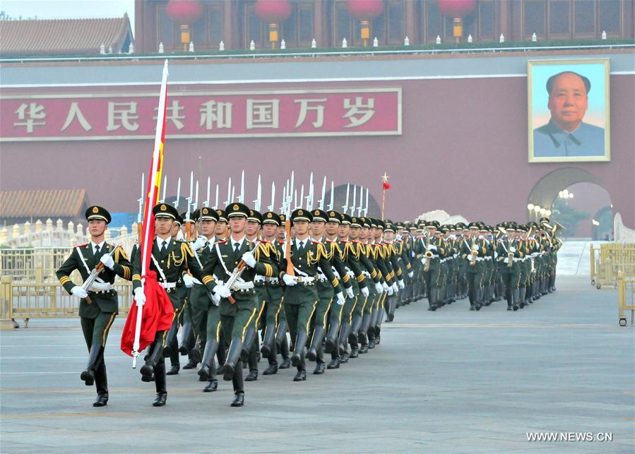 Over 100,000 people from across the country gathered at the square to watch the national flag-raising ceremony on the morning of Oct. 1, marking the 67th anniversary of the founding of the People's Republic of China. (Xinhua/Ju Huanzong) Over 100,000 people from across the country gathered at the square to watch the national flag-raising ceremony on the morning of Oct. 1, marking the 67th anniversary of the founding of the People's Republic of China. (Xinhua/Ju Huanzong)