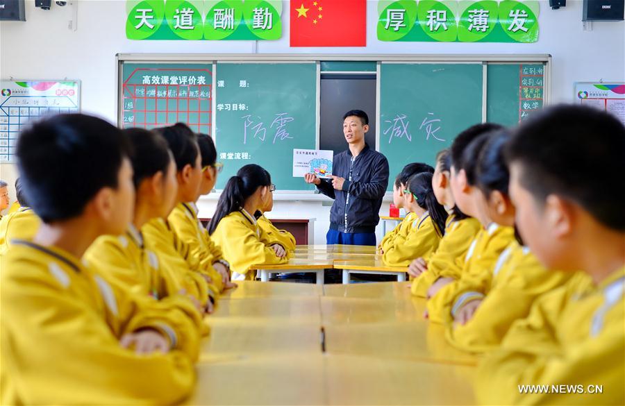 More than 2,000 teachers and students participated in the emergency earthquake drill aimed at raising awareness of disaster risk reduction and marking the International Day for Disaster Reduction, which is observed on Oct. 13.
