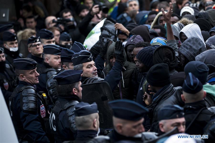 FRANCE-PARIS-MIGRANT CAMP-POLICE-EVACUATION