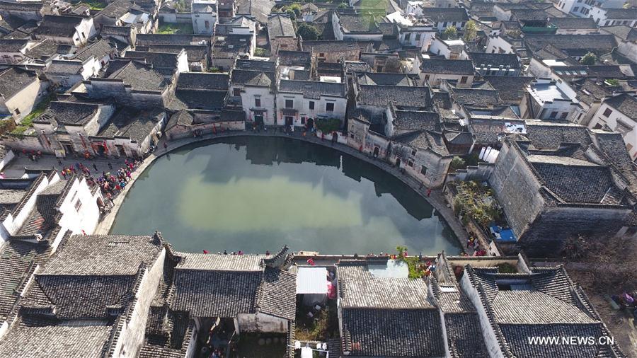 Photo taken on Nov. 26, 2016 shows the scenery of Yuezhao, or Moon Pool, at Hongcun, an ancient village in Yixian County in Huangshan City, east China's Anhui Province.