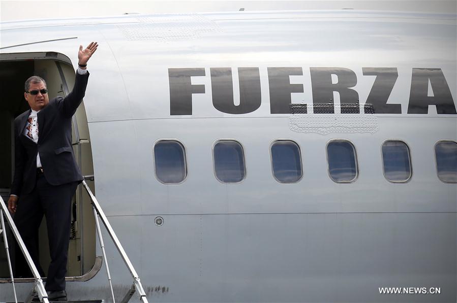Ecuadorian President Rafael Correa waves goodbye before his departure for Cuba to participate in a tribute to Cuban revolutionary leader Fidel Castro, at the Mariscal Sucre International Airport, in Quito, capital of Ecuador, on Nov. 29, 2016. Castro passed away late Friday night in Havana, Cuba, at the age of 90. (Xinhua/Santiago Armas)