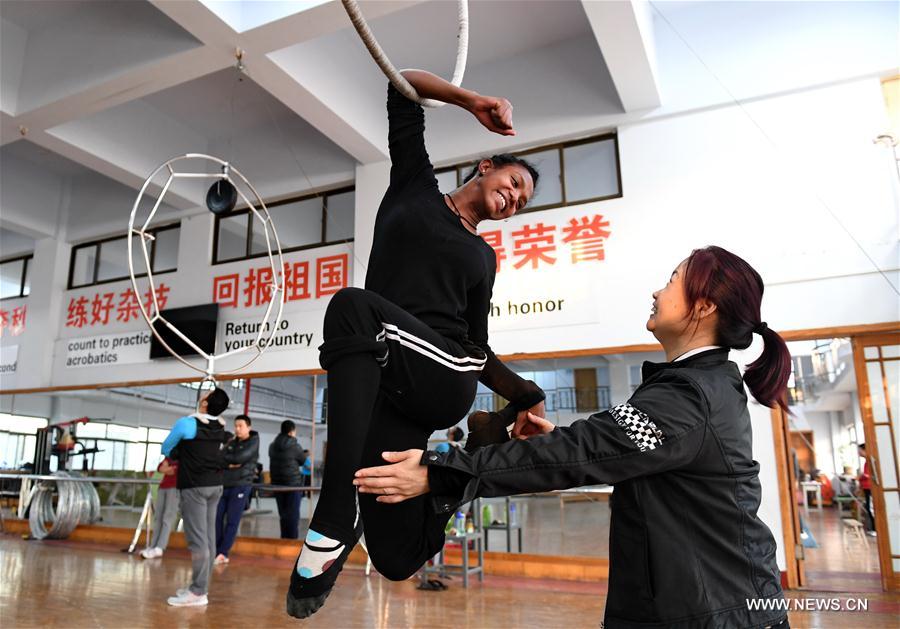 Foreign students from Ethiopia, Laos and other nations came to receive one-year training of acrobatics in Wuqiao in this July