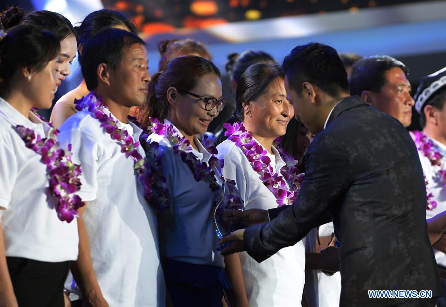 Winners of the Jack Ma Rural Teachers Award receive their awards during the awarding ceremony in Sanya, a tourism resort in south China's Hainan Province, on Jan. 5, 2017. The awarding ceremony of the Jack Ma Rural Teachers Award was held on Thursday, with 100 rural teachers winning the award of 100,000 yuan (14,522 U.S. dollars) respectively. (Xinhua/Yang Guanyu) Winners of the Jack Ma Rural Teachers Award receive their awards during the awarding ceremony in Sanya, a tourism resort in south China's Hainan Province, on Jan. 5, 2017. The awarding ceremony of the Jack Ma Rural Teachers Award was held on Thursday, with 100 rural teachers winning the award of 100,000 yuan (14,522 U.S. dollars) respectively. (Xinhua/Yang Guanyu)