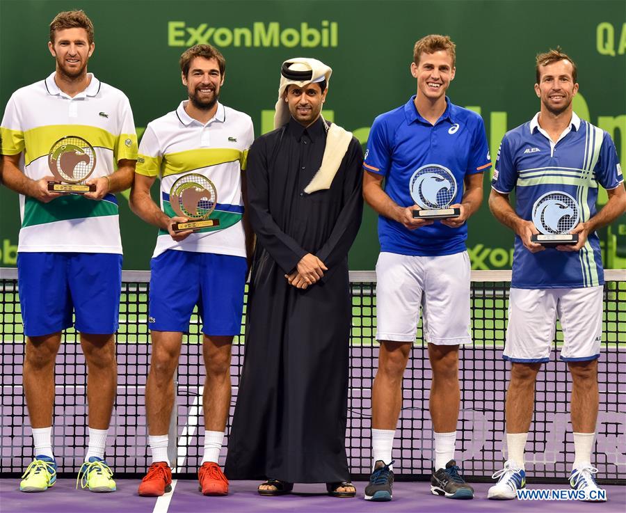 (L-R) Fabrice Martin, Jeremy Cardy of France, President of the Qatar Tennis Federation Nasser Al-Khelaifi, Vasek Pospisil of Canada and Radek Stepanek of the Czech Republic pose for a photo during the awarding ceremony for ATP Qatar Open tennis tournament doubles at the Khalifa International Tennis Complex in Doha, capital of Qatar on Jan. 6, 2017. Jeremy Chardy and Fabrice Martin claimed the title with 2-0. (Xinhua/Nikku) 