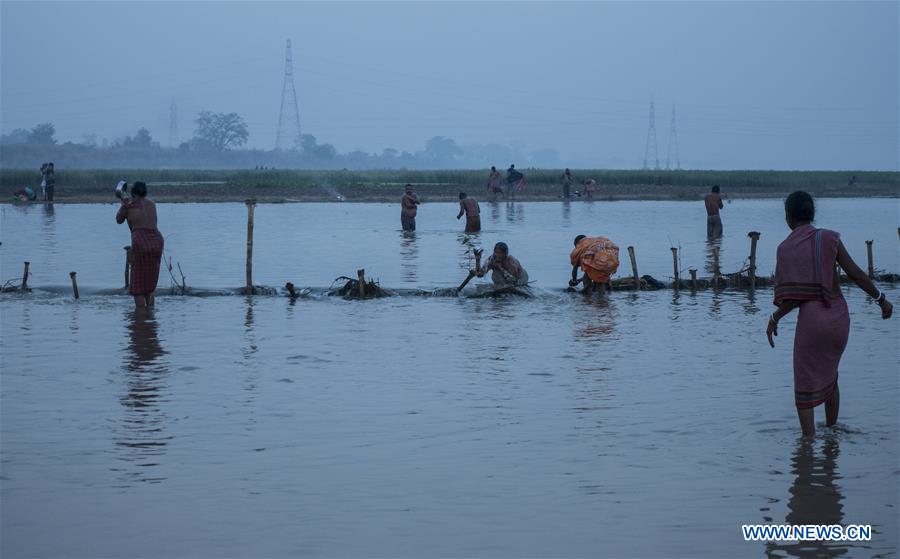 INDIA-KOLKATA-MAKAR SANKRANTI-HOLY DIP
