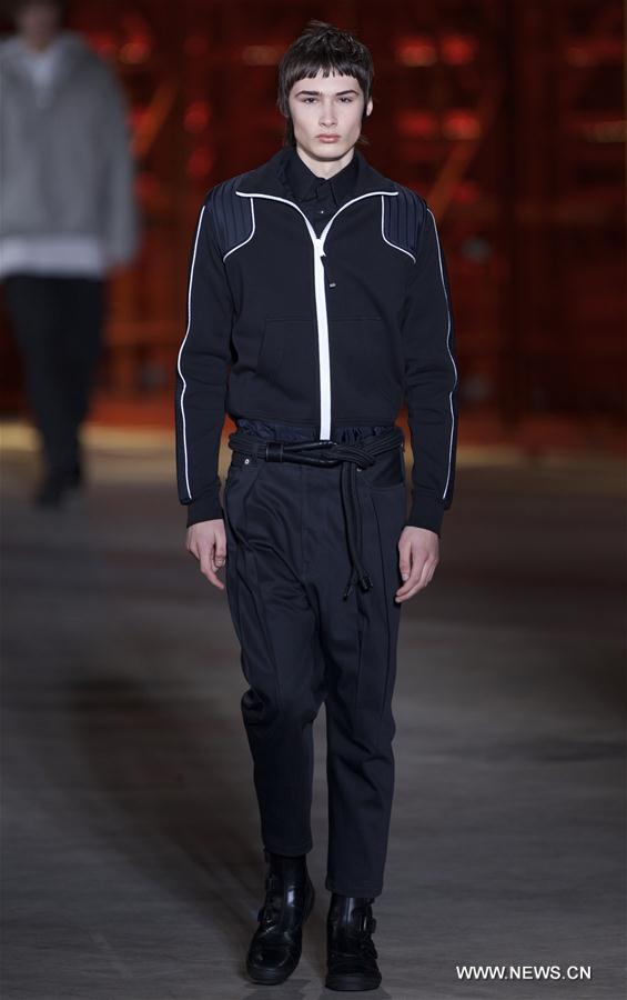Models present creations of Diesel Black Gold men's Fall-Winter 2017-2018 collection during Milan Fashion Week in Milan, Italy, on Jan. 14, 2017. 