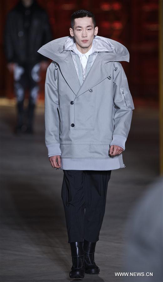Models present creations of Diesel Black Gold men's Fall-Winter 2017-2018 collection during Milan Fashion Week in Milan, Italy, on Jan. 14, 2017. 