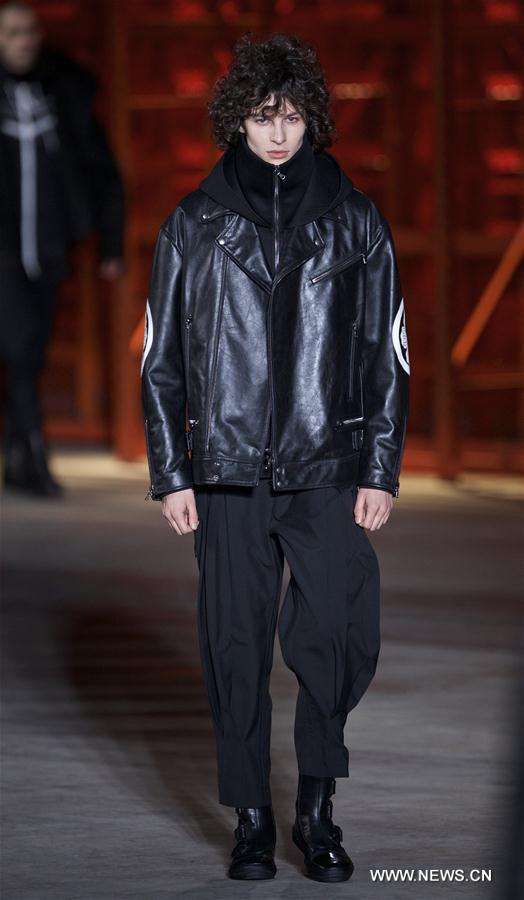 Models present creations of Diesel Black Gold men's Fall-Winter 2017-2018 collection during Milan Fashion Week in Milan, Italy, on Jan. 14, 2017. 