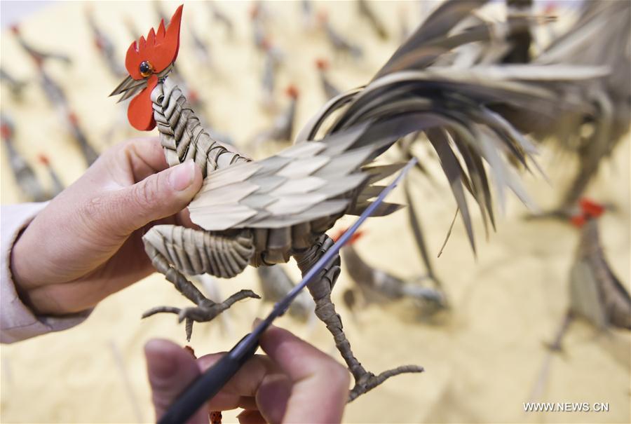 Jia Shujuan made nearly 100 palm-plaited roosters in a month for the upcoming Chinese traditional lunar New Year of Rooster, which starts from Jan. 28 this year. Jia Shujuan made nearly 100 palm-plaited roosters in a month for the upcoming Chinese traditional lunar New Year of Rooster, which starts from Jan. 28 this year.