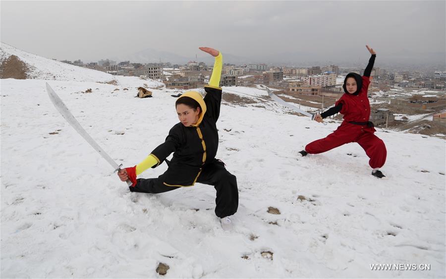 Afghan girls learn Wushu in the Shaolin Wushu club in Kabul