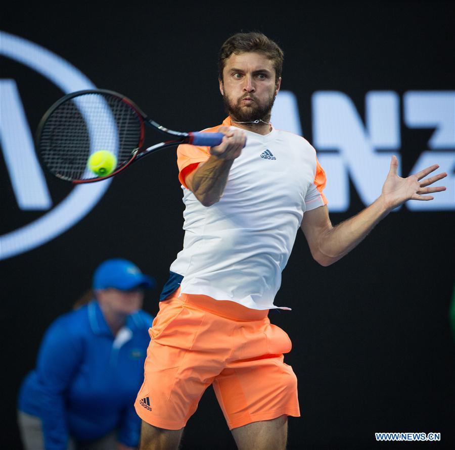 Gilles Simon of France returns the ball during the men's singles third round match against Milos Raonic of Canada at the Australian Open Tennis Championships in Melbourne, Australia, Jan. 21, 2017. Simon lost 1-3. (Xinhua/Zhu Hongye) 