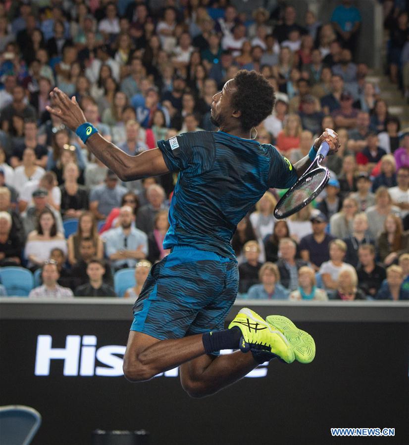 Gael Monfils of France competes during the men's singles third round match against Philipp Kohlschreiber of Germany at the Australian Open Tennis Championships in Melbourne, Australia, Jan. 21, 2017. Gael Monfils won 3-0. (Xinhua/Zhu Hongye) 