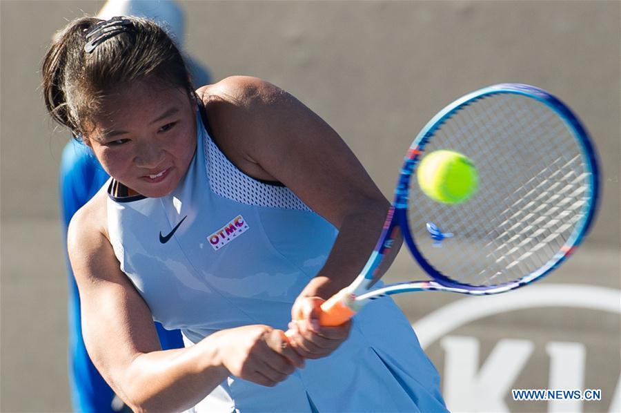 Yuan Chengyiyi of China returns the ball during the junior girls' singles first round match against Mihaela Lorena Marculescu of Romania at the Australian Open Tennis Championships in Melbourne, Australia, Jan. 21, 2017. Yuan won 2-0. (Xinhua/Bai Xue) 