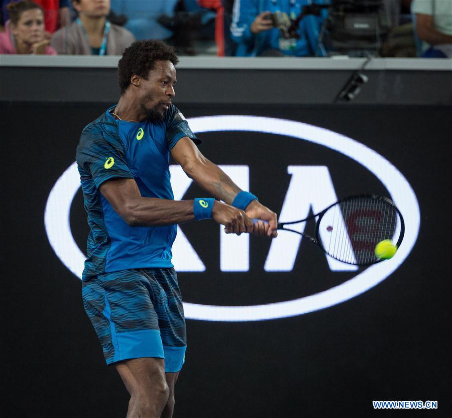 Gael Monfils of France returns the ball during the men's singles third round match against Philipp Kohlschreiber of Germany at the Australian Open Tennis Championships in Melbourne, Australia, Jan. 21, 2017. Gael Monfils won 3-0. (Xinhua/Zhu Hongye) 