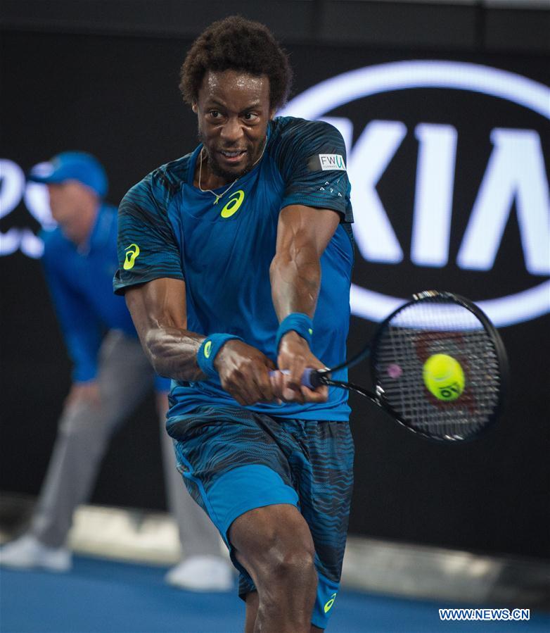 Gael Monfils of France returns the ball during the men's singles third round match against Philipp Kohlschreiber of Germany at the Australian Open Tennis Championships in Melbourne, Australia, Jan. 21, 2017. Gael Monfils won 3-0. (Xinhua/Zhu Hongye) 