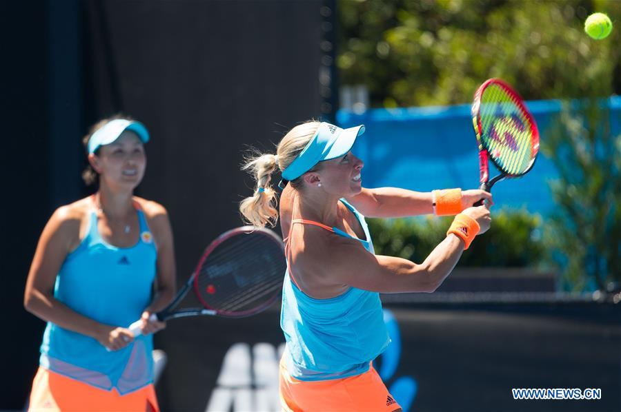 Peng Shuai of China and Andrea Hlavackova (R) of the Czech Republic compete during the women's doubles third round match against Andreja Klepac of Slovenia and Maria Jose Martinez Sanchez of Spain at the Australian Open Tennis Championships in Melbourne, Australia, Jan. 22, 2017. Peng and Hlavackova won 2-0. (Xinhua/Bai Xue) Peng Shuai of China and Andrea Hlavackova (R) of the Czech Republic compete during the women's doubles third round match against Andreja Klepac of Slovenia and Maria Jose Martinez Sanchez of Spain at the Australian Open Tennis Championships in Melbourne, Australia, Jan. 22, 2017. Peng and Hlavackova won 2-0. (Xinhua/Bai Xue)