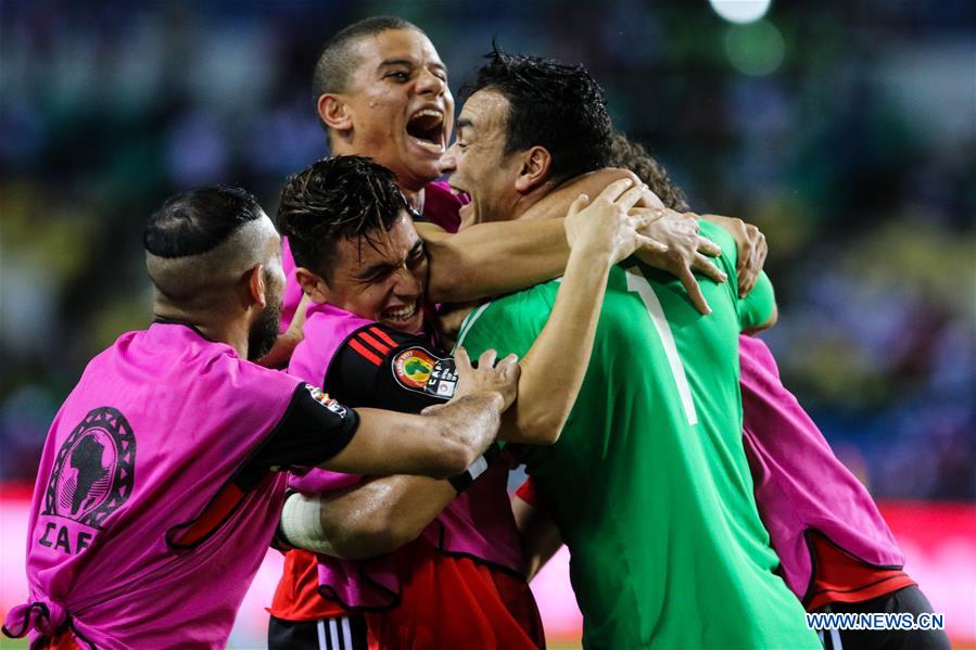 Players of Egypt celebrate after winning a semifinal match of 2017 Africa Cup of Nations between Egypt and Burkina Faso in Libreville, Gabon, Feb. 1, 2017. Egypt won 4-3 to enter the final. (Xinhua/Waleed Zain) 