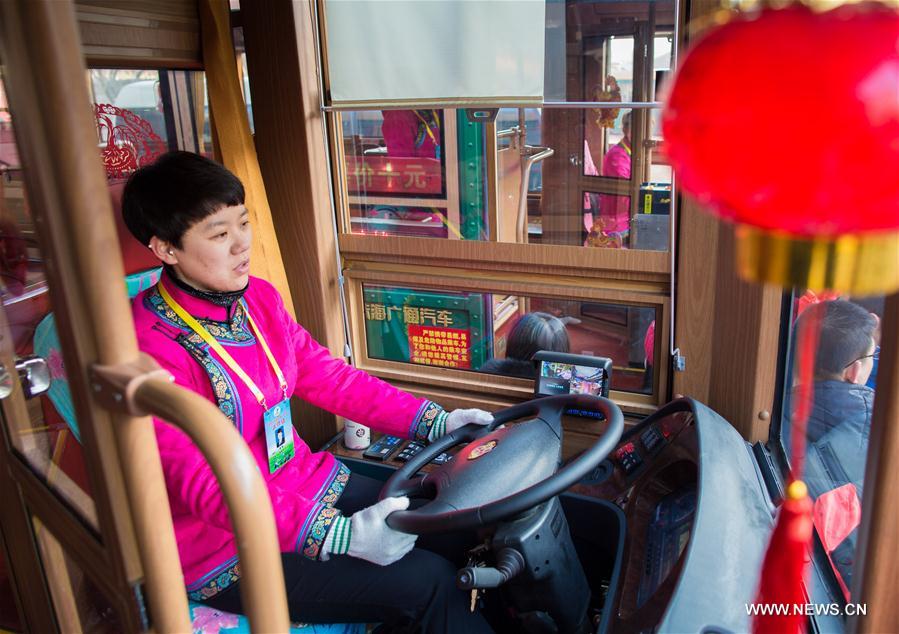These buses are modelled after the old-fashioned trams, known as 'dangdang' buses, after the sound of the bells drivers used instead of horns.