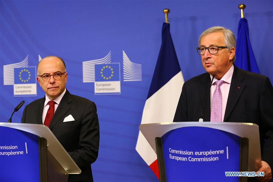 EU-BRUSSELS-CAZENEUVE-JUNCKER