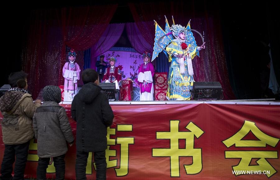 'Quyi' refers to folk vocal arts such as ballad singing, story-telling, comic dialogue, clapper talk and crosstalk. 'Quyi' refers to folk vocal arts such as ballad singing, story-telling, comic dialogue, clapper talk and crosstalk.