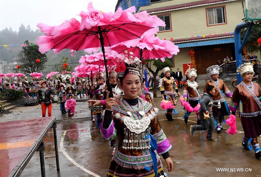 People of Miao ethnic group dance during a gathering to strengthen friendship and to celebrate the Spring Festival, or the Chinese Lunar New Year, at Lindong Village in Rongshui Miao Autonomous County, south China's Guangxi Zhuang Autonomous Region, Feb. 7, 2017 People of Miao ethnic group dance during a gathering to strengthen friendship and to celebrate the Spring Festival, or the Chinese Lunar New Year, at Lindong Village in Rongshui Miao Autonomous County, south China's Guangxi Zhuang Autonomous Region, Feb. 7, 2017