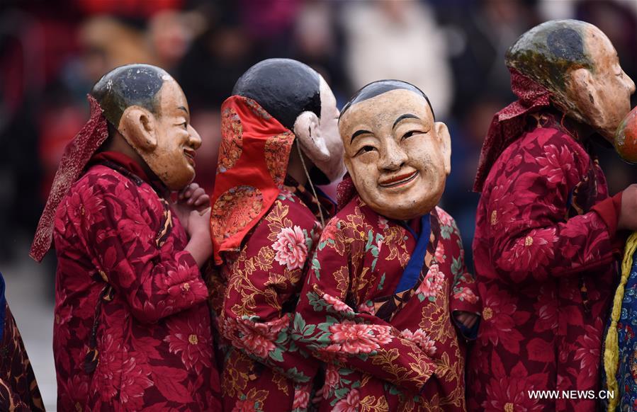 A monk performs 'Tiaoqian', a masked religious dance with a history of nearly 300 years, at the Kumbum Monastery in Huangzhong County, northwest China's Qinghai Province, Feb. 10, 2017. A monk performs 'Tiaoqian', a masked religious dance with a history of nearly 300 years, at the Kumbum Monastery in Huangzhong County, northwest China's Qinghai Province, Feb. 10, 2017.
