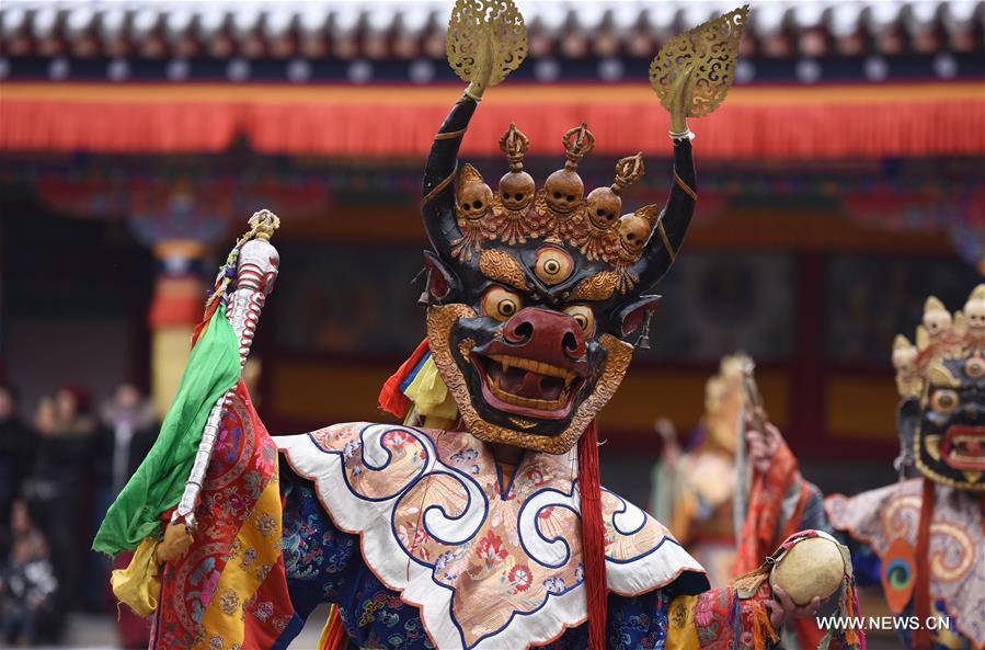 A monk performs 'Tiaoqian', a masked religious dance with a history of nearly 300 years, at the Kumbum Monastery in Huangzhong County, northwest China's Qinghai Province, Feb. 10, 2017. CN) A monk performs 'Tiaoqian', a masked religious dance with a history of nearly 300 years, at the Kumbum Monastery in Huangzhong County, northwest China's Qinghai Province, Feb. 10, 2017. CN)
