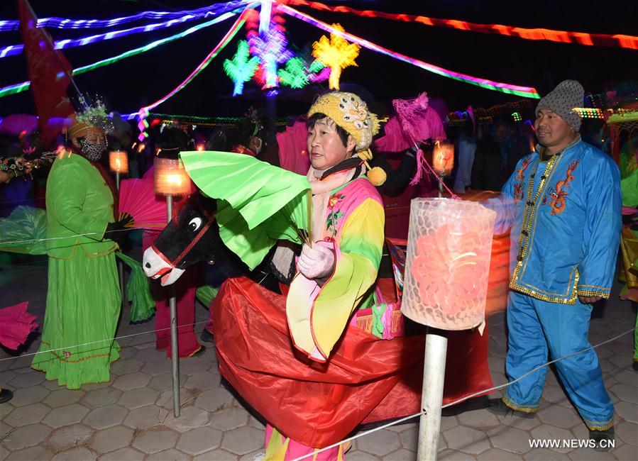 People perform Yangge dance during a festive ritual to pray for a good year at Guanyingzi Village of Mongolian Autonomous County of Fuxin, northeast China's Liaoning Province, Feb. 11, 2017. People perform Yangge dance during a festive ritual to pray for a good year at Guanyingzi Village of Mongolian Autonomous County of Fuxin, northeast China's Liaoning Province, Feb. 11, 2017.