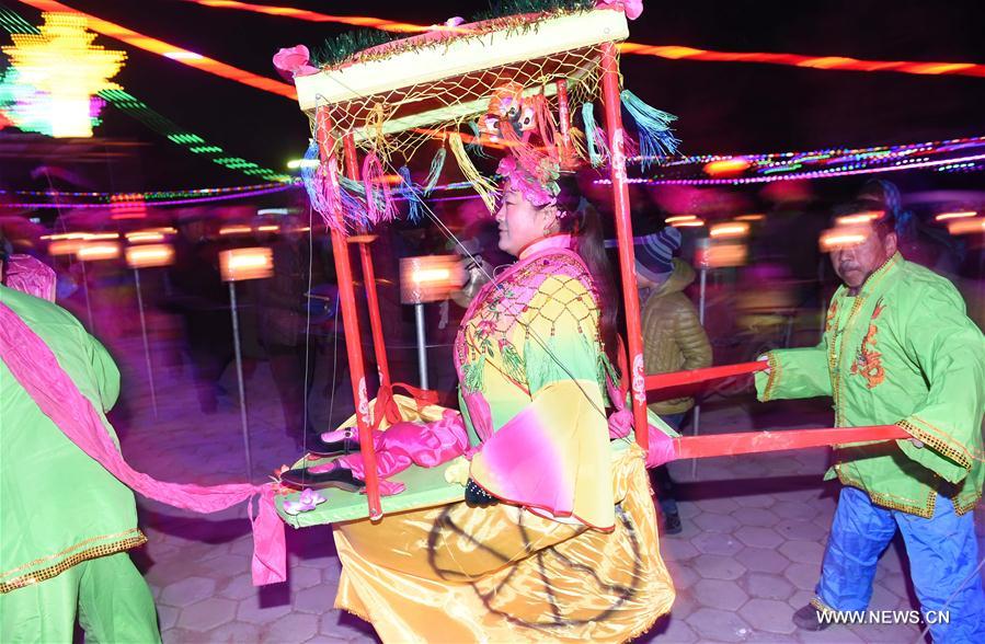 People perform Yangge dance during a festive ritual to pray for a good year at Guanyingzi Village of Mongolian Autonomous County of Fuxin, northeast China's Liaoning Province, Feb. 11, 2017. People perform Yangge dance during a festive ritual to pray for a good year at Guanyingzi Village of Mongolian Autonomous County of Fuxin, northeast China's Liaoning Province, Feb. 11, 2017.