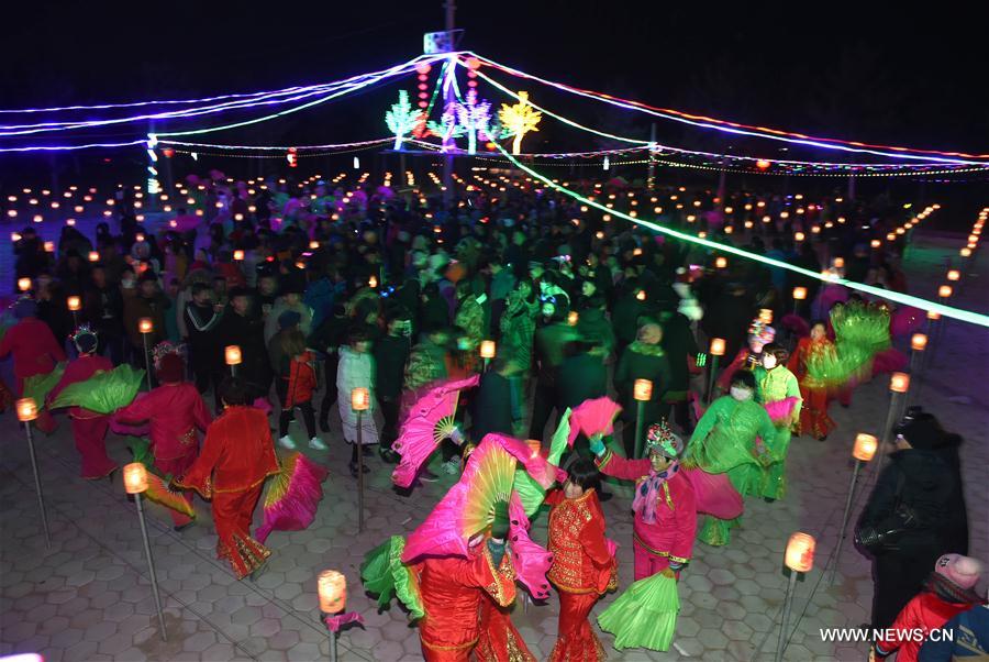 People perform Yangge dance during a festive ritual to pray for a good year at Guanyingzi Village of Mongolian Autonomous County of Fuxin, northeast China's Liaoning Province, Feb. 11, 2017. People perform Yangge dance during a festive ritual to pray for a good year at Guanyingzi Village of Mongolian Autonomous County of Fuxin, northeast China's Liaoning Province, Feb. 11, 2017.