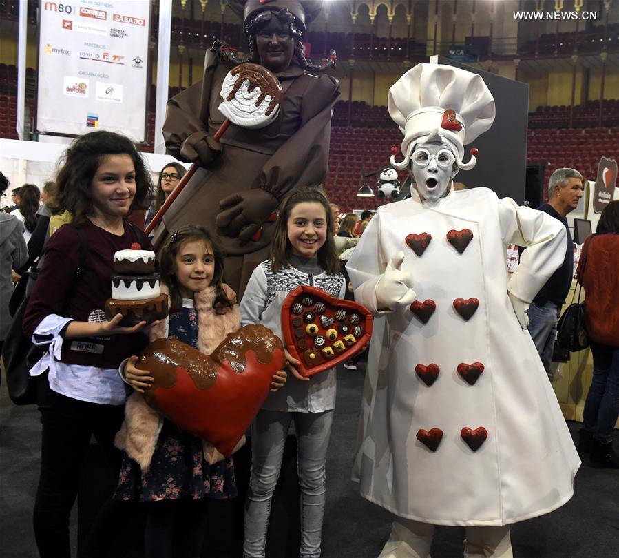 People visit the chocolate fair at Campo Pequeno Square in Lisbon, capital of Portugal, Feb. 12, 2017.