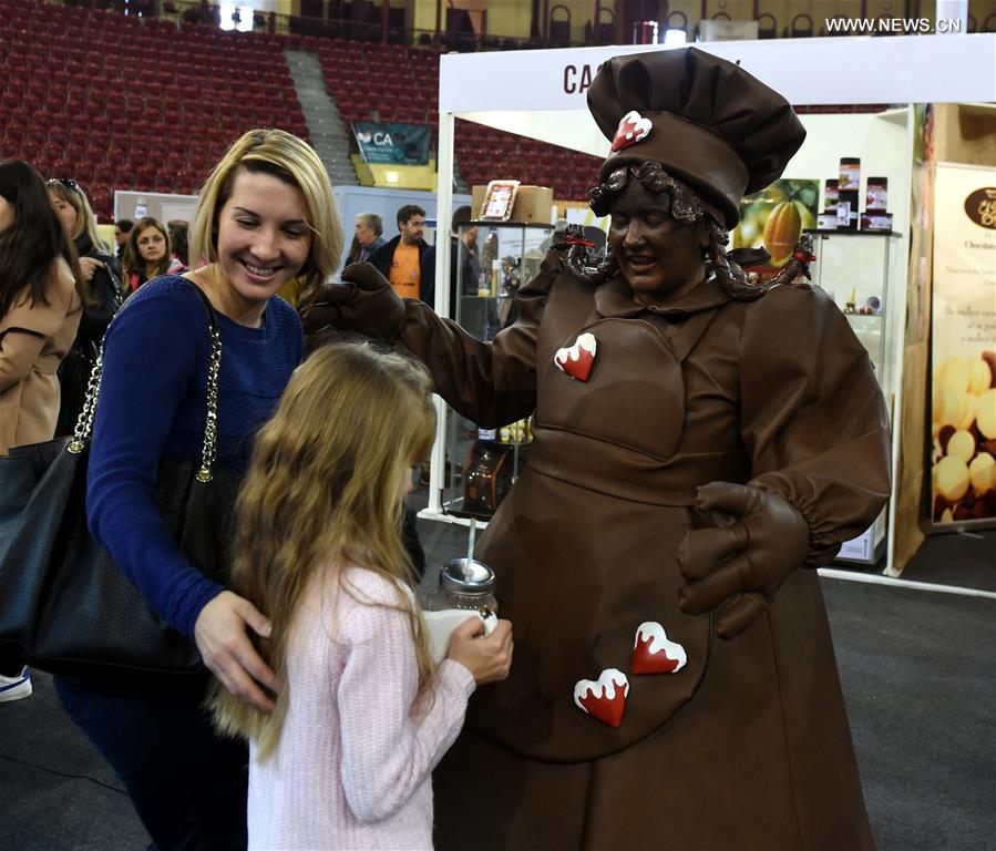 People visit the chocolate fair at Campo Pequeno Square in Lisbon, capital of Portugal, Feb. 12, 2017.