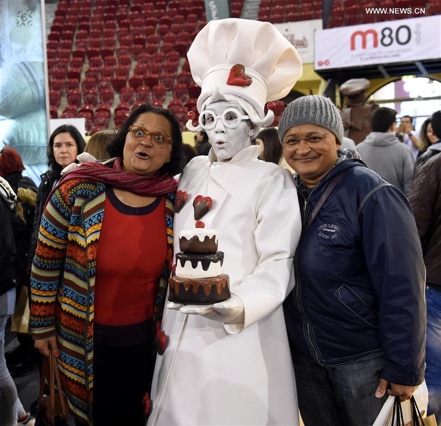 People visit the chocolate fair at Campo Pequeno Square in Lisbon, capital of Portugal, Feb. 12, 2017.