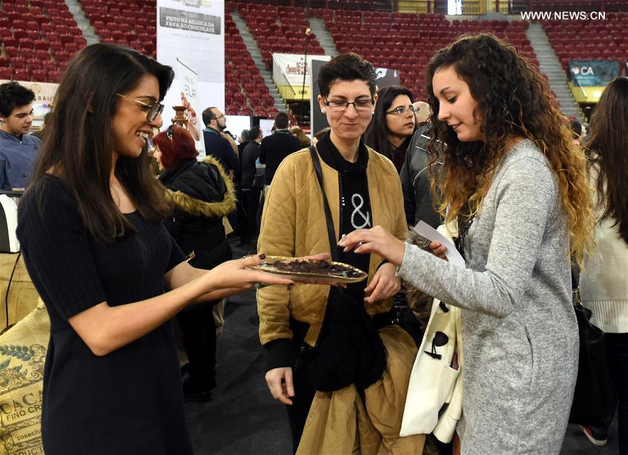People visit the chocolate fair at Campo Pequeno Square in Lisbon, capital of Portugal, Feb. 12, 2017. People visit the chocolate fair at Campo Pequeno Square in Lisbon, capital of Portugal, Feb. 12, 2017.