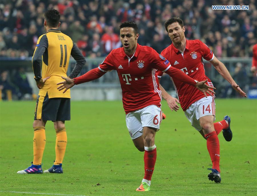 Bayern Munich's Thiago Alcantara (C) celebtates scoring during the first leg match of Round of 16 of European Champions League between Bayern Munich and Arsenal in Munich, Germany, on Feb. 15, 2017. 