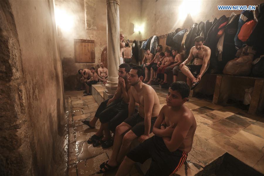 Palestinians relax in Hamam al-Samra, a traditional Turkish steam bath, in Gaza City, on Feb. 15, 2017.