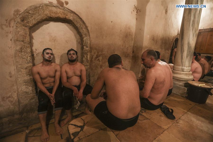 Palestinians relax in Hamam al-Samra, a traditional Turkish steam bath, in Gaza City, on Feb. 15, 2017.
