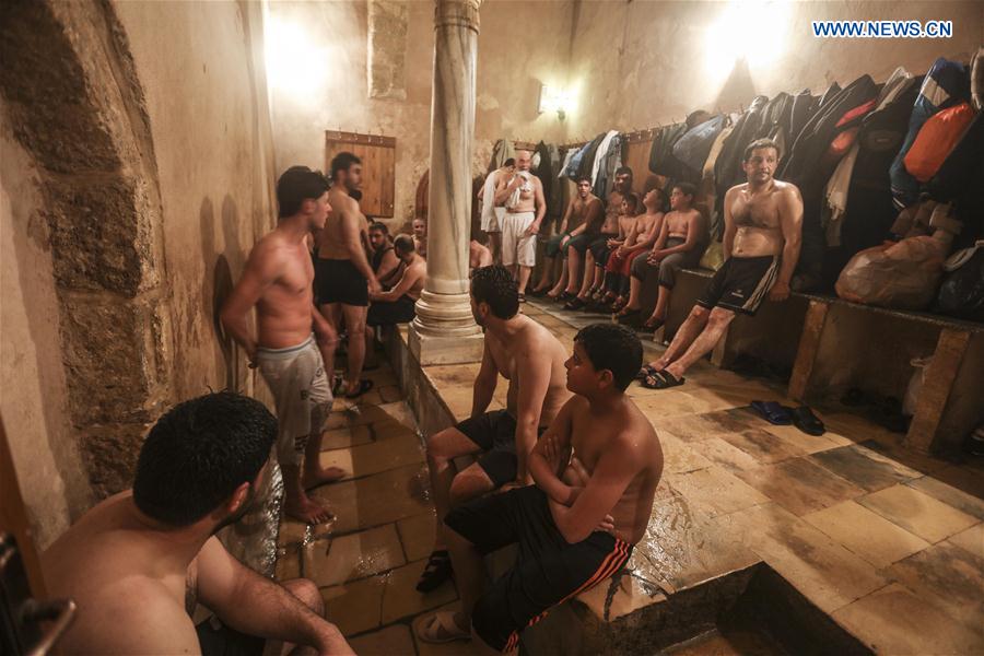 Palestinians relax in Hamam al-Samra, a traditional Turkish steam bath, in Gaza City, on Feb. 15, 2017.