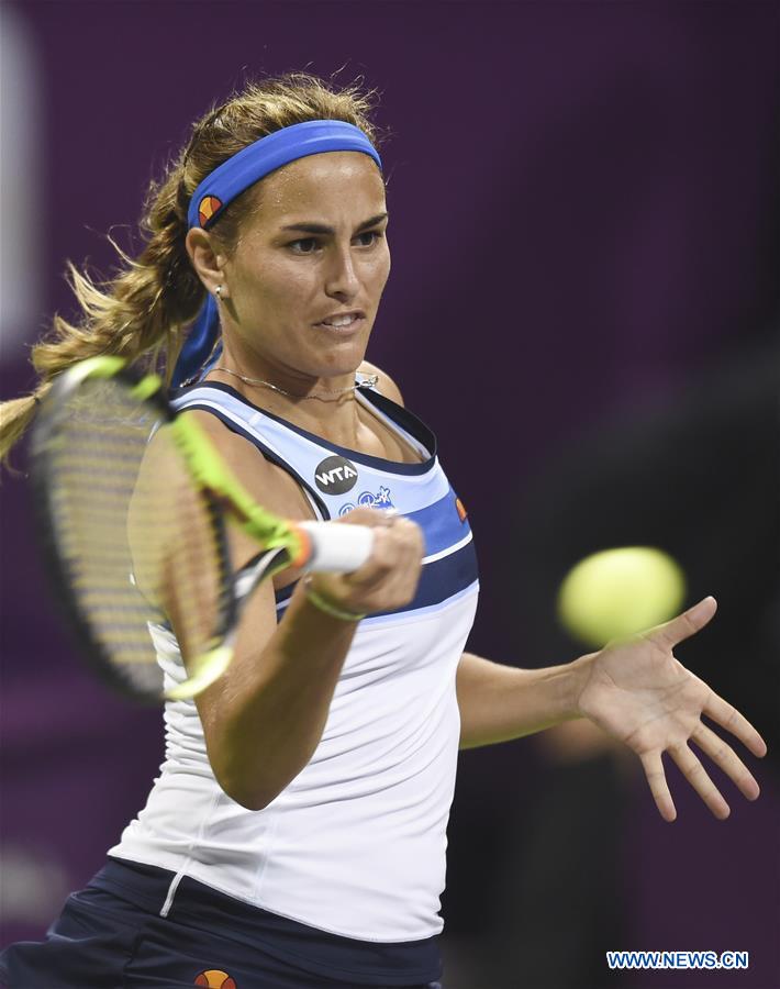 Monica Puig of Puerto Rico returns the ball during tthe women's singles quarterfinal against Daria Kasatkina of Russia at WTA Qatar Open 2017 at the International Khalifa Tennis Complex of Doha, Qatar, Feb. 16, 2017. The match was suspended due to the rain. (Xinhua/Nikku) 