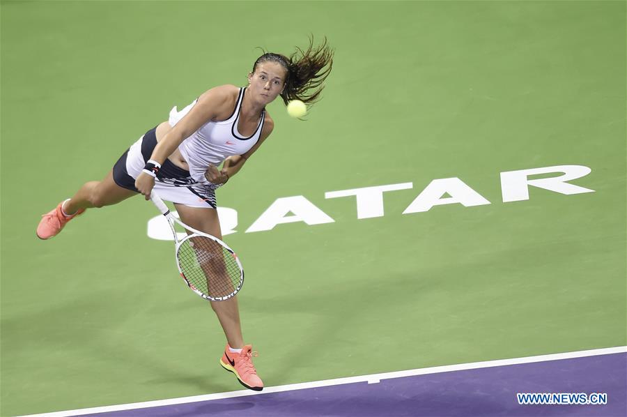 Daria Kasatkina of Russia serves during the women's singles quarterfinal against Monica Puig of Puerto Rico at WTA Qatar Open 2017 at the International Khalifa Tennis Complex of Doha, Qatar, Feb. 16, 2017. The match was suspended due to the rain. (Xinhua/Nikku) 