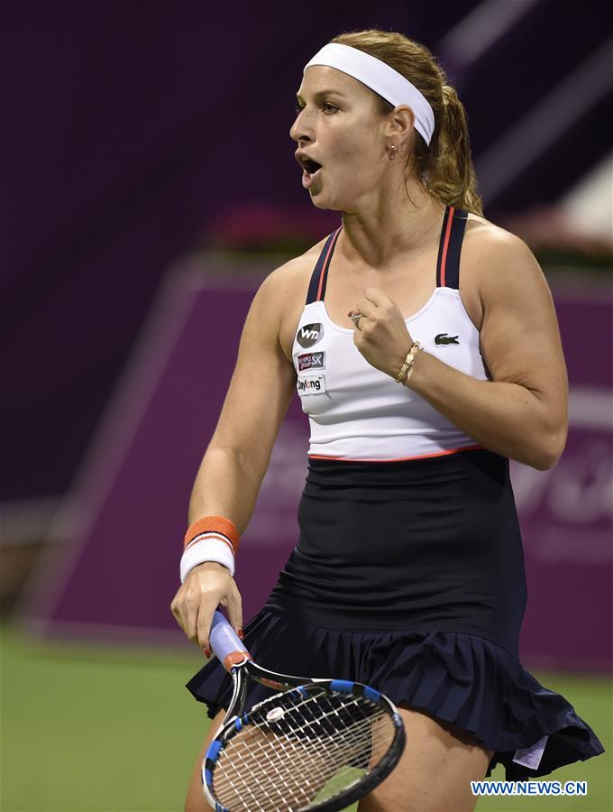 Dominika Cibulkova of Slovakia celebrates during the women's singles quarterfinal against Samantha Stosur of Australia at WTA Qatar Open 2017 at the International Khalifa Tennis Complex of Doha, Qatar, Feb. 16, 2017. Dominika Cibulkova won 2-0. (Xinhua/Nikku) 
