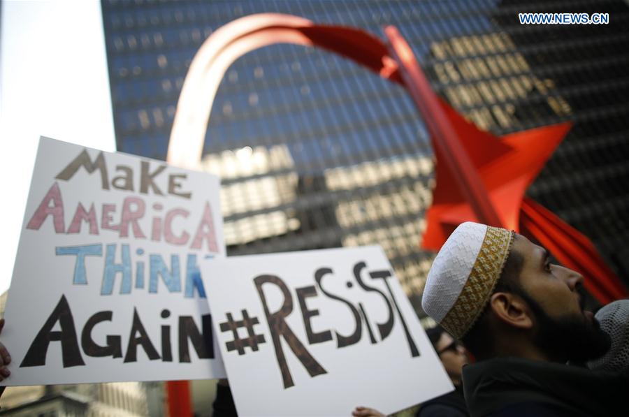 Protesters gather calling for a general strike against U.S. President Donald Trump in Chicago, the United States, on Feb. 17, 2017. 