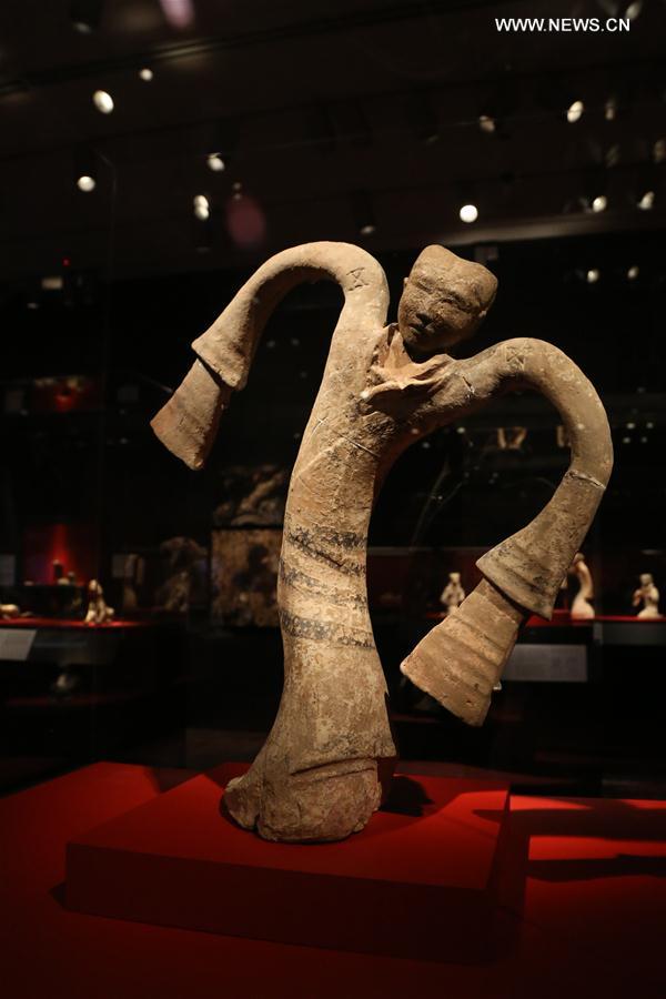 A dancer figurine of the Han Dynasty is displayed during the exhibition 'Tomb Treasures: New Discoveries from China's Han Dynasty' at the Asian Art Museum in San Francisco, the United States, on Feb. 17, 2017.