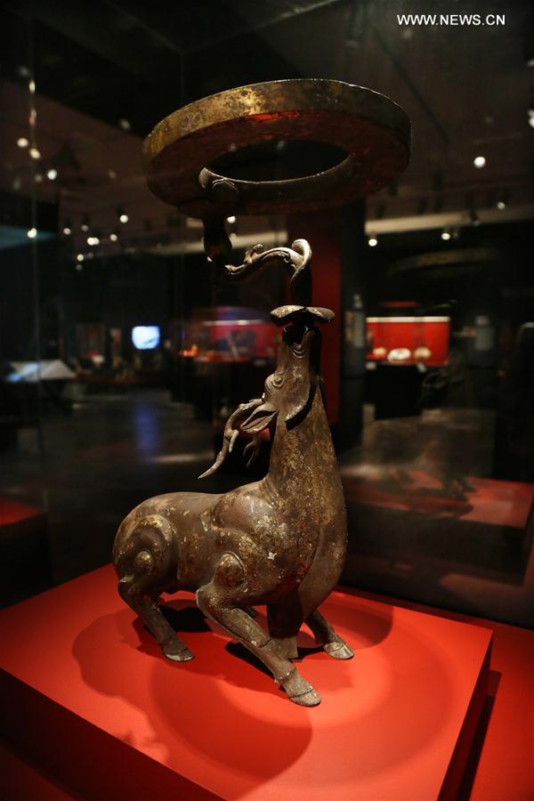 A lamp in the shape of a deer of the Han Dynasty is displayed during the exhibition 'Tomb Treasures: New Discoveries from China's Han Dynasty' at the Asian Art Museum in San Francisco, the United States, Feb. 17, 2017.