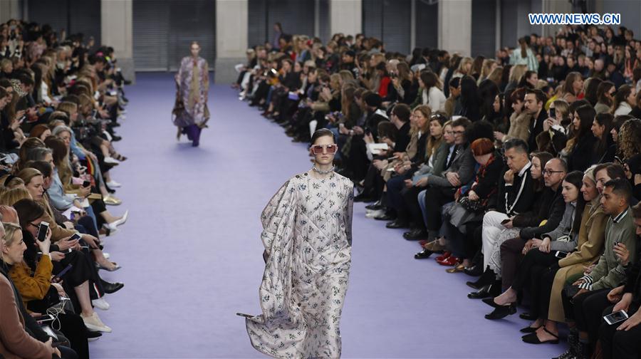 A model showcases a design at the Mulberry show during the London Fashion Week February 2017 collections in London, Britain, on Feb. 19, 2017.